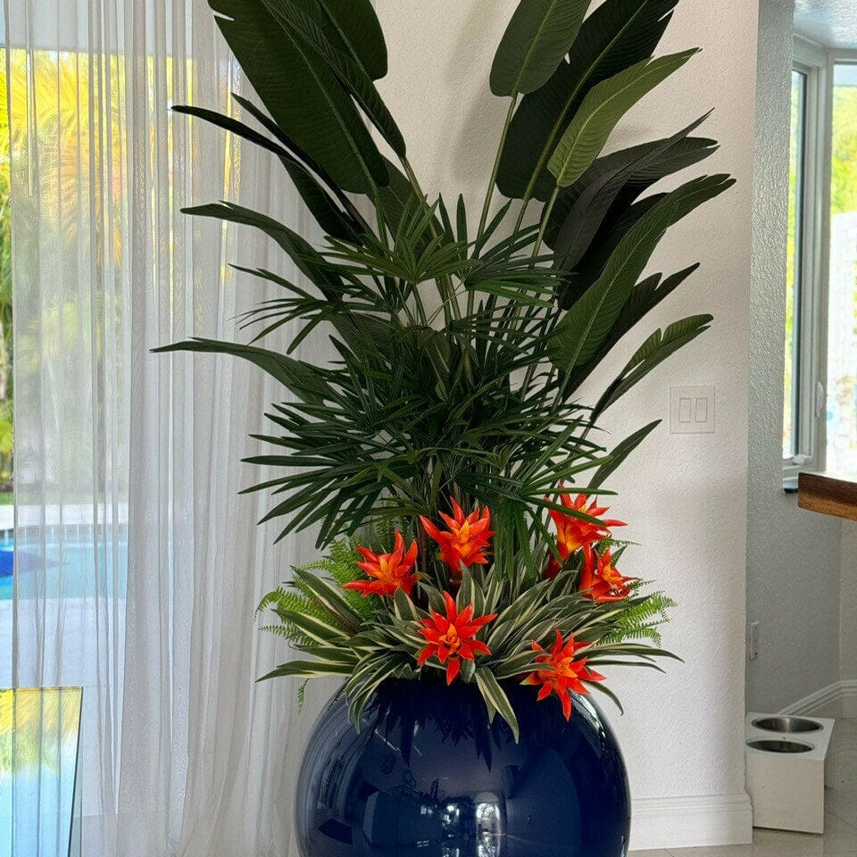 Mix of Tropical Plants in a Cobalt Blue Globe Planter The New Garden