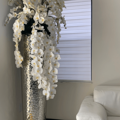 Cascading Phalaenopsis Orchids in Extra Tall Hammered Vase The New Garden 